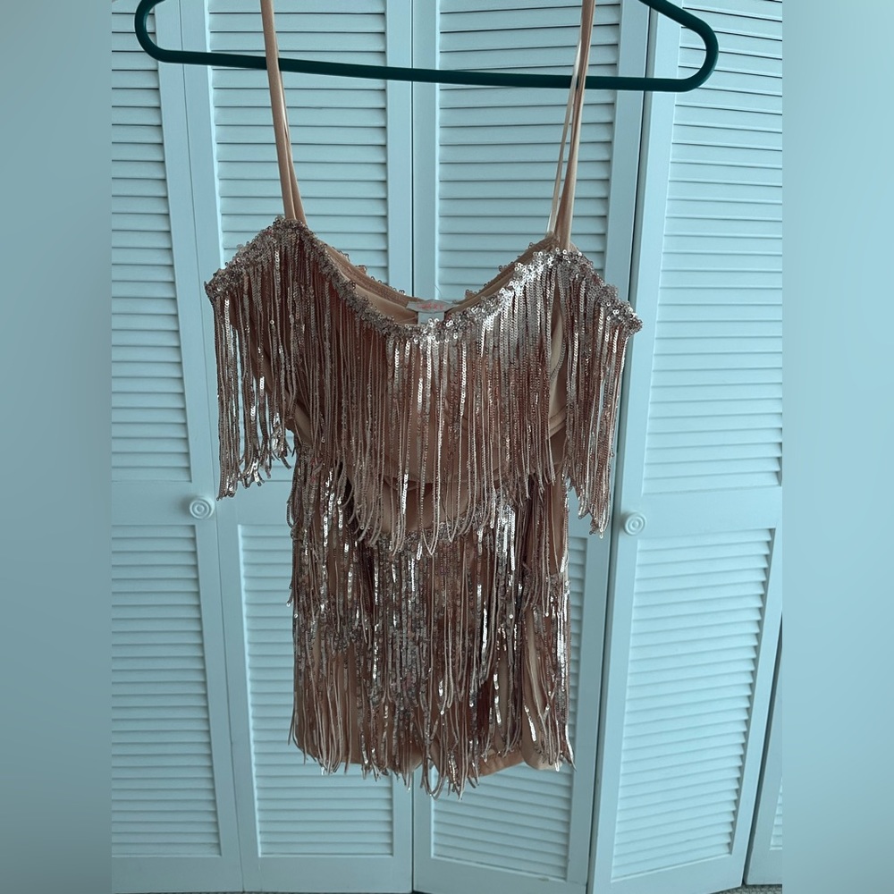 Two piece sequin top and short tassel suit